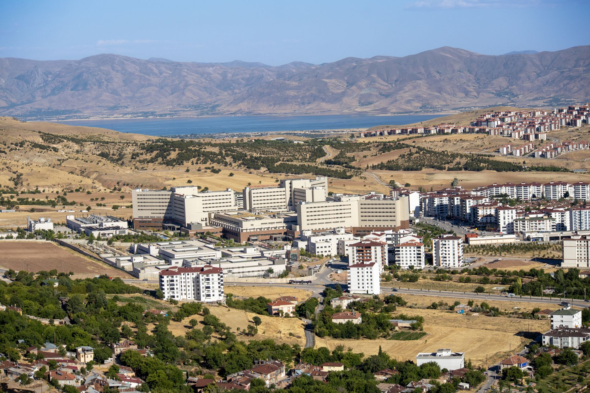 Stunning aerial photograph capturing the expansive cityscape of Elâzığ, Türkiye, with distant mountains. — Watch Sports, Movi